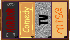 Shelf of 4 VHS tapes.